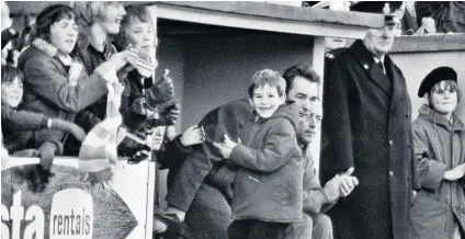  ??  ?? Family affair: Nigel Clough in the stands at Burton Albion’s Pirelli Stadium and (left) with father, Brian, in the dugout in 1973
