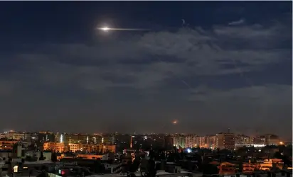  ?? (SANA/Reuters) ?? MISSILE FIRE is seen over Damascus, Syria, last month.