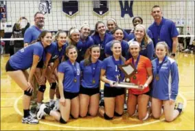  ?? KIRK NEIDERMYER - FOR DIGITAL FIRST MEDIA ?? Exeter poses with the trophy after winning the BCIAA championsh­ip at Wyomissing High School in Wyomissing on Tuesday, October 24.