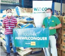  ??  ?? From left: Wilcon Depot AVP for Logistics Bernard Carles and logistics manager Eddie Tabungar