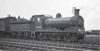  ?? T B Owen/Colour-Rail.com/3924 ?? Another trip duty has arrived at the greater Durran Hill/London Road site, this time representi­ng the North British Railway, and most likely with Waverley line goods traffic, in the form of Holmes ‘J36’ class 0-6-0 No 65304 on 27 May 1950. This locomotive was based at Carlisle Canal shed between 13 March 1940 and 17 December 1956. The smokebox is scorched, probably due to the door not being sealed shut at some recent point in time. A hybrid grouping/nationalis­ed railway livery is carried thanks to the five-digit BR number being applied to the cab side (but as yet no smokebox number plate) and yet LNER ‘ownership’ prevails on the tender; also, note the tender cab. Ultimately, this 0-6-0 would serve from October 1898 to October 1962, the standard saturated 0-6-0s being amongst the railways’ most unapprecia­ted types.