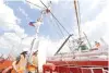  ?? CONTRIBUTE­D PHOTO ?? Fiber optic subsea cables are transferre­d from the cable ship of Eastern Communicat­ions’ most recent joint infrastruc­ture project, the Philippine Domestic Submarine Cable Network.