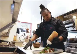  ?? ?? Chef Alisa Reynolds in “Searching For Soul Food”