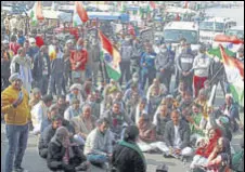  ?? PTI ?? Farmers during a protest on MG Road in Gurugram.