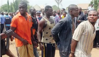  ?? Photo: Force Headquarte­rs ?? Suspected members of a notorious kidnap gang being paraded by the police at Owerri in Imo State yesterday. The corpse of the gang leader, Henry Chibueze alias Vampire (not shown) was also displayed