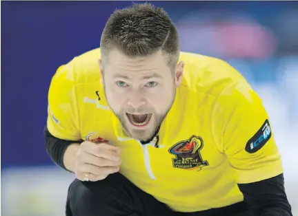  ?? ADRIAN WYLD/THE CANADIAN PRESS ?? Skip Mike McEwen, from Winnipeg, lost a close 6-5 match against Calgary’s Kevin Koe in a battle of early unbeatens at the 2017 Roar of the Rings Canadian Olympic curling trials in Ottawa Tuesday afternoon. Koe improved to 5-0 in the event, while McEwen...