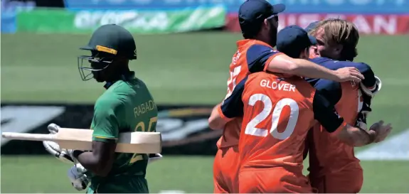  ?? | BRENTON EDWARDS AFP ?? NETHERLAND­S players celebrate their win over South Africa at Adelaide Oval on November 6.