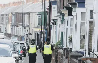  ??  ?? Police in Roker Avenue.