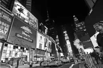  ??  ?? A clock countdowns the minutes left before the ‘Force Friday’ event for the release of new ‘Star Wars: The Last Jedi’ products outside the Walt Disney Co. store in New York last Aug 31. — WP-Bloomberg file photo