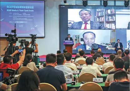  ??  ?? Delegates attend the Regional Comprehens­ive Economic Partnershi­p Media & Think Tank Forum in Haikou, Hainan province, on Sunday.