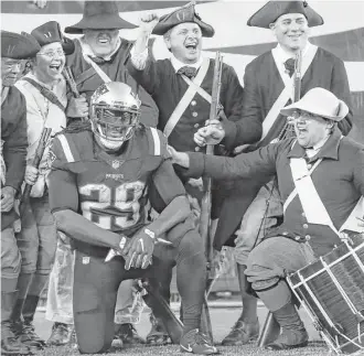  ?? Brett Coomer / Houston Chronicle ?? The Minutemen celebrate a touchdown by Patriots running back LeGarrette Blount. The Patriots have a knack for pleasing fans.