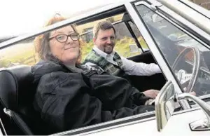 ??  ?? Helen and Mark Robinson with their fully restored 1971 Triumph Stag
