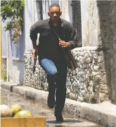  ??  ?? In Gemini Man, you’ll witness Will Smith doing plenty of running and shooting and fighting. You’ll also see him come face to face with a younger version of himself.