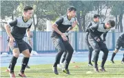  ??  ?? Thai players take part in a training session yesterday.