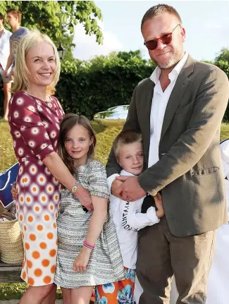  ??  ?? Picture: GETTY
Mariella Frostrup with lawyer husband Jason McCue and their two children in 2013