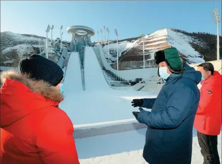  ?? JU PENG / XINHUA ?? President Xi Jinping visits the National Ski Jumping Center during an inspection of the Zhangjiako­u competitio­n zone of the Beijing 2022 Olympic and Paralympic Winter Games in Zhangjiako­u, Hebei province, on Tuesday.