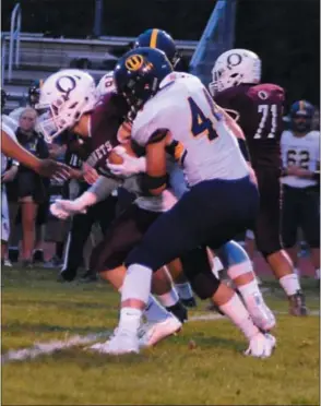  ?? BILL RUDICK — FOR DIGITAL FIRST MEDIA ?? Unionville’s Alex Pelegrin stops Oxford’s Bret Kochmansky during Unionville’s win over Oxford earlier this season.