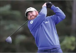  ?? The Associated Press ?? American J.B. Holmes shot 5-under 66 in the first round at the Royal Portrush course for his first lead in a major tournament in 11 years.