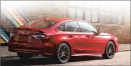  ?? PHOTO: HONDA ?? The new 11th-generation Honda Civic sedan has matured, in some ways resembling the larger Accord. Note that the two-door coupe is no longer offered.