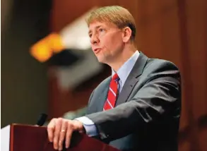  ??  ?? RICHMOND: In this March 26, 2015, file photo, Consumer Financial Protection Bureau Director Richard Cordray speaks during a panel discussion in Richmond, Va. A new CFPB report found that more than one in four consumers felt threatened when contacted by...