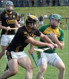  ??  ?? Lorcan French (Adamstown) and Matty Byrne (HWH-Bunclody) in a battle for the ball.