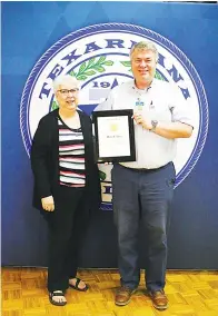  ?? Photo courtesy of TC ?? ■ Nancy Lyn Storey, left, and Mark Storey receive Texarkana College’s Endowed Chair for Teaching Excellence Award on Wednesday at TC’s Spring Awards Ceremony in Texarkana, Texas.