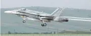  ??  ?? Two Royal Canadian Air Force CF-18s on a training exercise in Florida were wheels down when they were told they were landing at an abandoned airfield.