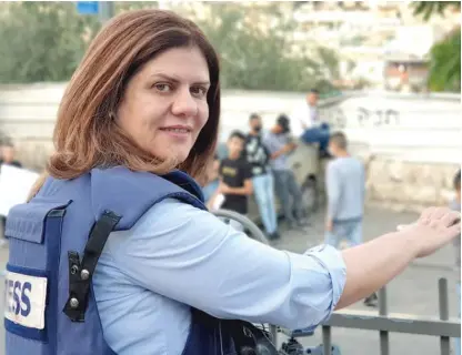  ?? PROVIDED, VIA GETTY IMAGES ?? Shireen Abu Akleh, shown reporting from Jerusalem last year. was shot dead on May 11 as she covered a raid on the Jenin refugee camp in the occupied West Bank.