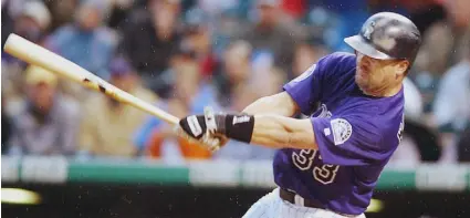  ?? Craig F. Walker, The Denver Post ?? Rockies outfielder Larry Walker began focusing on baseball in his late teens after giving up on a career as a hockey goalie.