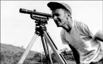  ?? Brinkerhof­f family ?? Early in his career, landscape architect Don Brinkerhof­f surveys property for a project.