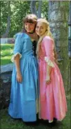  ?? FILE PHOTO ?? Sisters Callista, right and Demetra Zorbas of Colonie smile on set for “The Adventures of Snow White and Rose Red” in the gardens of the SurreyWill­iamson Inn at Skidmore College in Saratoga Springs.