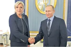  ??  ?? Russia’s president Vladimir Putin held a surprise meeting with Marine Le Pen in Moscow