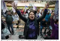  ?? (AP/Carlos Noriega) ?? Supporters of presidenti­al candidate Daniel Noboa celebrate the early results of the runoff presidenti­al election Sunday in Quito, Ecuador.