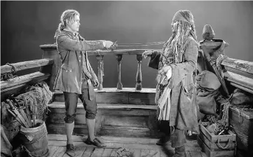  ??  ?? Thwaites (Henry) and Depp (Captain Jack Sparrow) in ‘Pirates of the Caribbean: Dead Men Tell No Tales’. — Courtesy of Walt Disney Studios