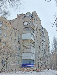  ??  ?? Photo by the Investigat­ive Committee of Russia shows a view of the damaged residentia­l building after it was hit by a gas explosion in the town of Shakhty in in southern Russia. — AFP photo