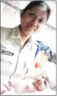  ??  ?? RPF constable Neeta Majhi with the baby girl she helped deliver at Dadar railway station.