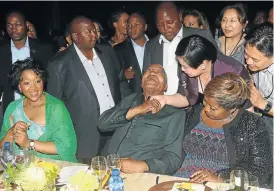  ?? Picture: ESA ALEXANDER ?? PRESSING THE FLESH: Two of President Jacob Zuma’s wives, Thobeka Madiba-Zuma, left, and Bongi Ngema-Zuma, right, flank him at the gala dinner