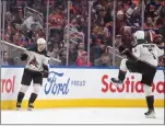  ?? THE CANADIAN PRESS PHOTO ?? Arizona Coyotes’ Matias Maccelli and Michael Kesselring celebrate a goal against the Edmonton Oilers during overtime NHL action in Edmonton on Friday.