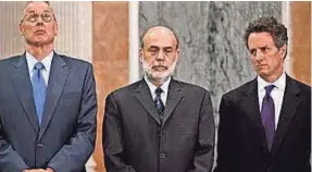  ?? SONY CLASSICS ?? Ex-Fed chairman Ben Bernanke, center, is flanked by ex-treasury chiefs Henry Paulson, left, and Timothy Geithner in 2010’s “Inside Job.”