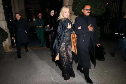  ?? Photograph: Pierre Suu/GC Images ?? Kate Moss and the designer Haider Ackermann leaving the Ritz Hotel to celebrate her 50th birthday in Paris.