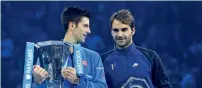  ??  ?? Novak Djokovic with Roger Federer. —