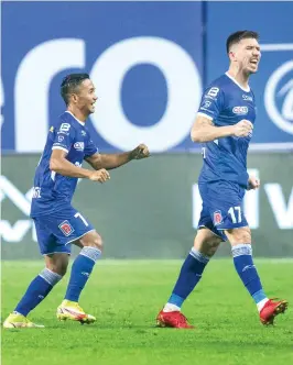  ?? ?? Chennaiyin FC forward Mirlan Murzaev (right) celebrates after scoring a stunning goal against Odisha FC in an ISL match in Goa on Saturday