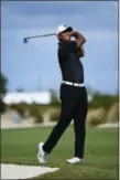  ?? DANTE CARRER - AP ?? Tiger Woods hits from the fourth fairway at the Hero World Challenge golf tournament at Albany Golf Club in Nassau, Bahamas, Thursday.