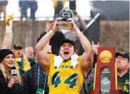  ?? AP PHOTO BY MICHAEL AINSWORTH ?? North Dakota State fullback Hunter Luepke celebrates after helping the Bison to a 38-10 win against Montana State in the FCS title game Saturday in Frisco, Texas.