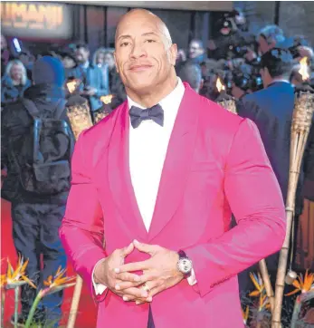  ?? FOTO: MATT CROSSICK/DPA ?? US-Schauspiel­er Dwayne „The Rock“Johnson – hier bei der Premiere des Films „Jumanji: The Next Level“– feiert am 2. Mai seinen 50. Geburtstag.