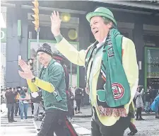  ?? PAIGE TAYLOR WHITE TORONTO STAR ?? Mayor John Tory, seen marching in the St. Patrick's Day Parade last Sunday, did not rule out getting involved with ward races to help ensure political allies are elected to council.