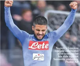  ??  ?? Napoli’s Lorenzo Insigne celebrates after scoring for his side against Sassuolo yesterday Photo: AP