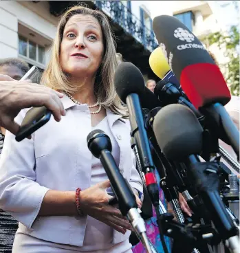  ?? JACQUELYN MARTIN/THE ASSOCIATED PRESS ?? Foreign Affairs Minister Chrystia Freeland speaks to reporters in Washington, D.C., on Thursday. She said negotiator­s have been working round the clock to reach a deal.