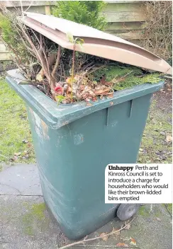  ??  ?? Unhappy Perth and Kinross Council is set to introduce a charge for householde­rs who would like their brown-lidded bins emptied