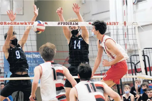  ?? GARY MIDDENDORF/DAILY ?? Marist’s Marty Canavan tries to score off the block against Lincoln-Way East’s Ian Nicholson (14) during a sectional championsh­ip match in Chicago on June 15, 2021. SOUTHTOWN